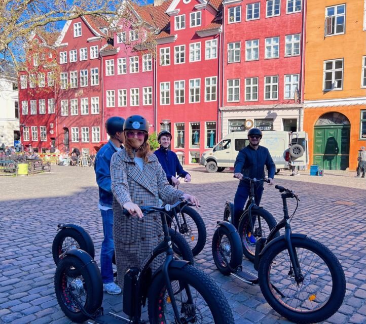 Copenhagen: Guided E-Scooter KickBike Tour- All Highlights - Start at Nikolaj Plads 34: training, helmets, and the ride-ready setup