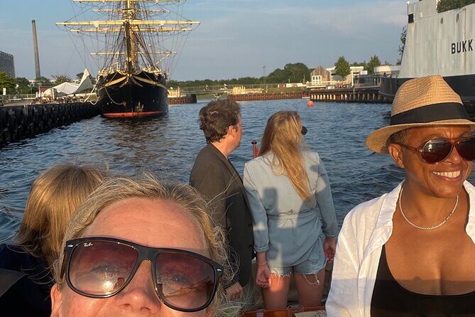 Private Copenhagen Boat cruise in Scandinavian mahogany boat - Christianshavns Kanal: houseboats, bars, and the slower side of the city
