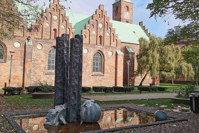 The Ancient Viking Stronghold of Aros: A Self-Guided Audio Tour in Aarhus - Millers Street and the Latin Quarter: where your walk turns into wandering