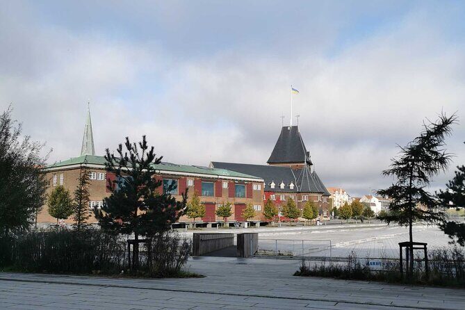 The Ancient Viking Stronghold of Aros: A Self-Guided Audio Tour in Aarhus - Stop-by-stop: DOKK1 and the waterfront-to-old-town story